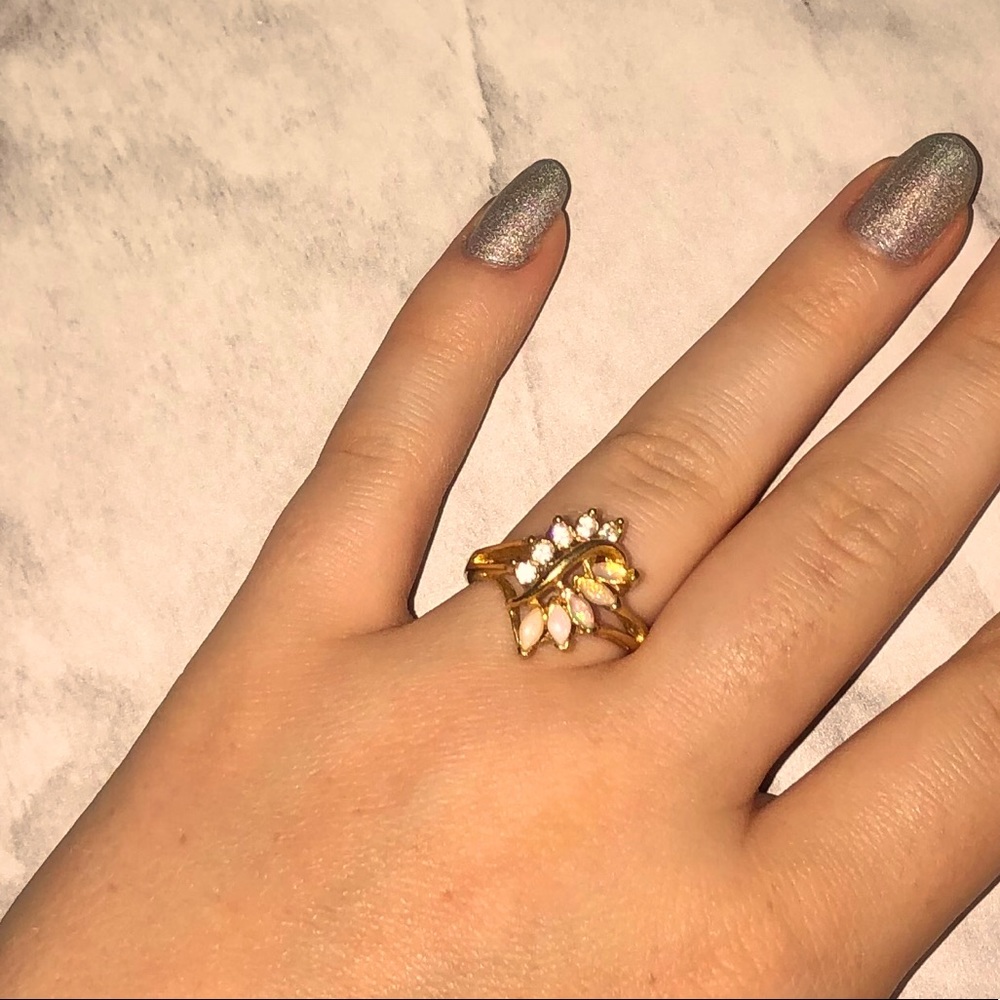 Gold banded ring with opal